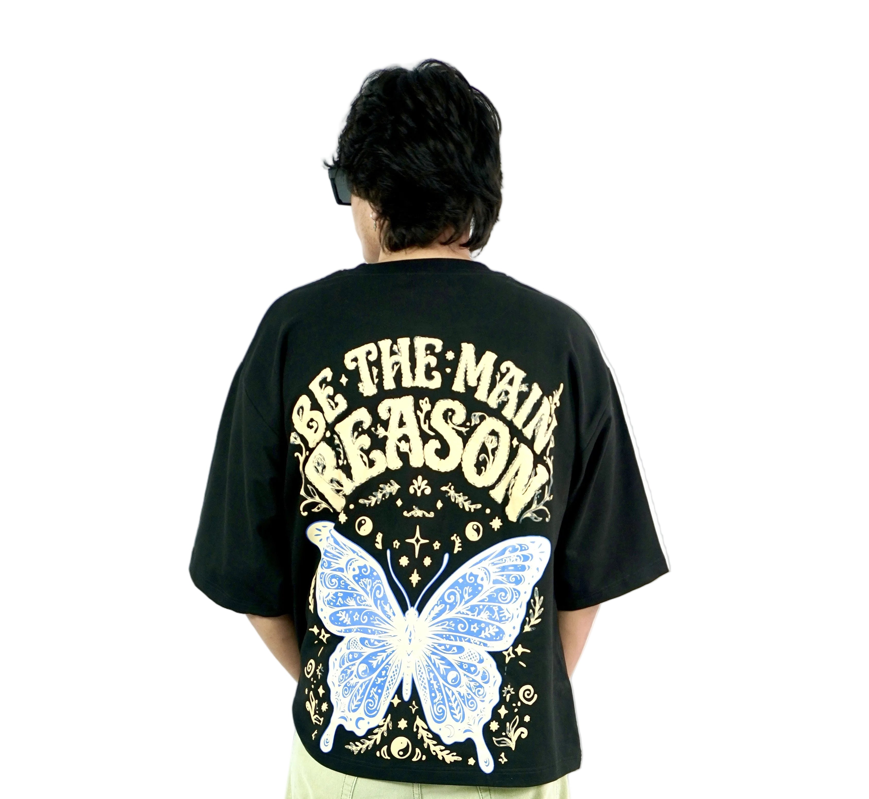 Back view of TAMRAT black boxy fit t-shirt showing detailed blue butterfly graphic and typography