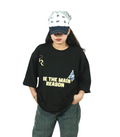 TAMRAT Black Boxy Fit T-shirt with 'Be The Main Reason' graphic and blue butterfly print worn with a cap
