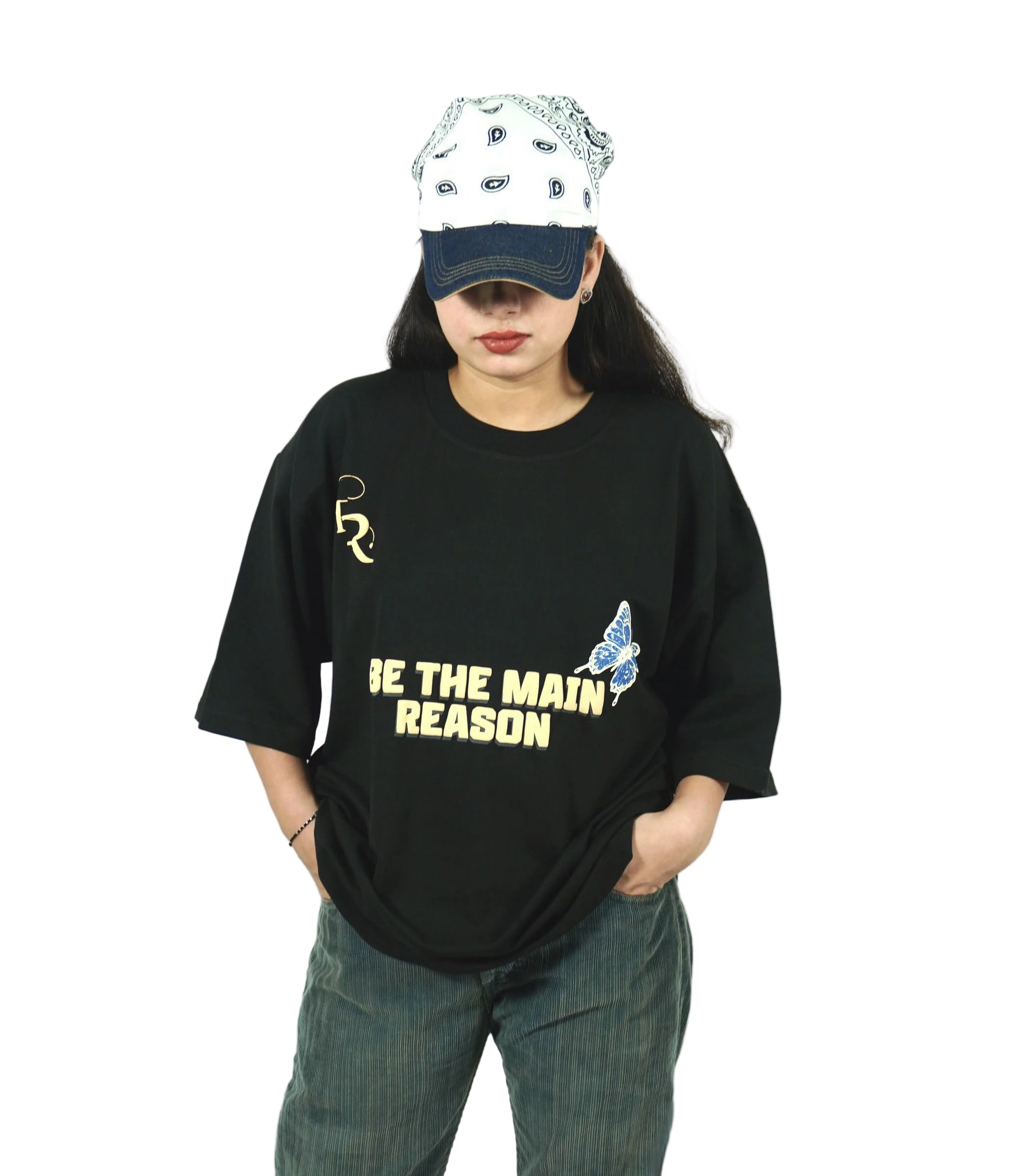 TAMRAT Black Boxy Fit T-shirt with 'Be The Main Reason' graphic and blue butterfly print worn with a cap